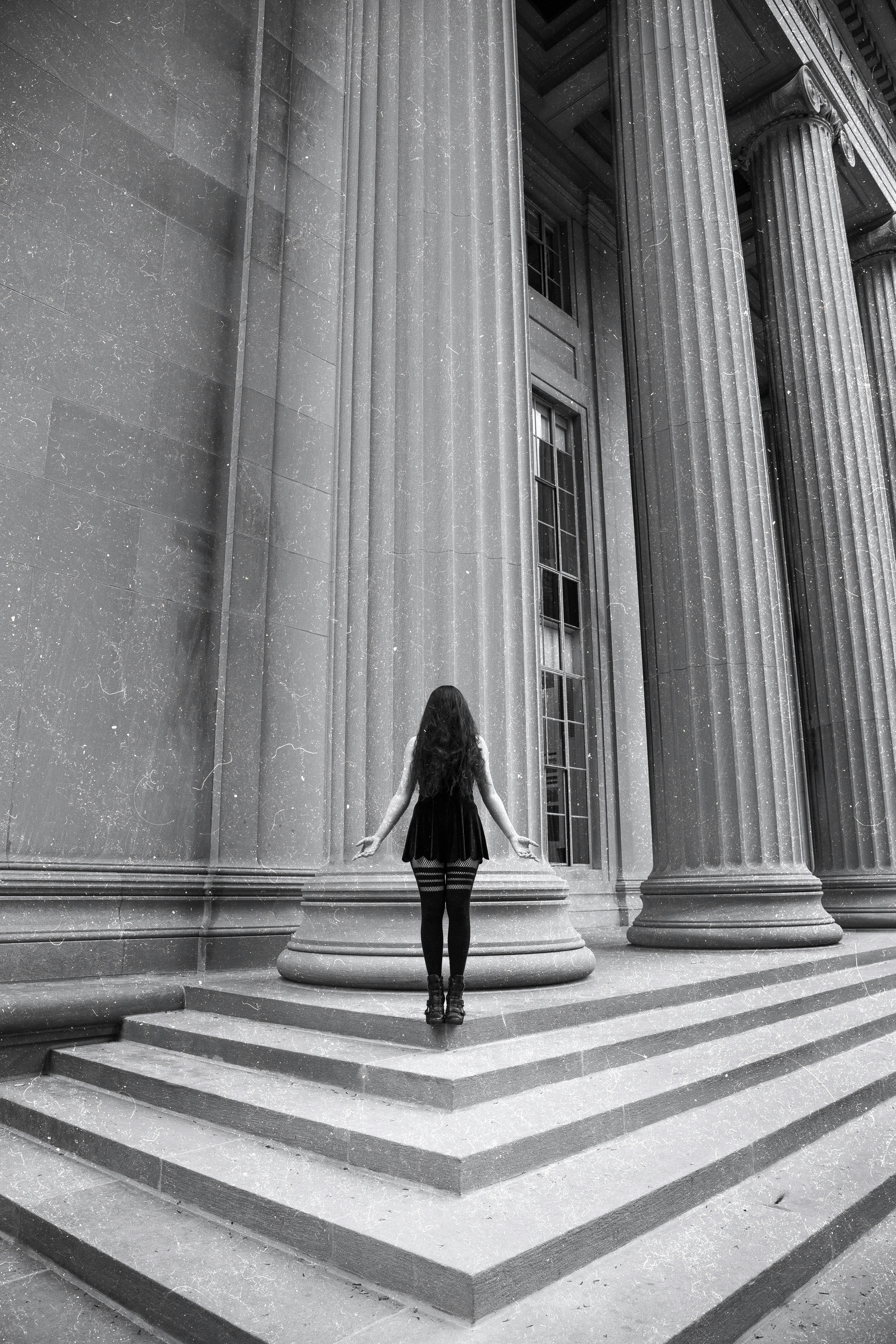 woman standing on stairs